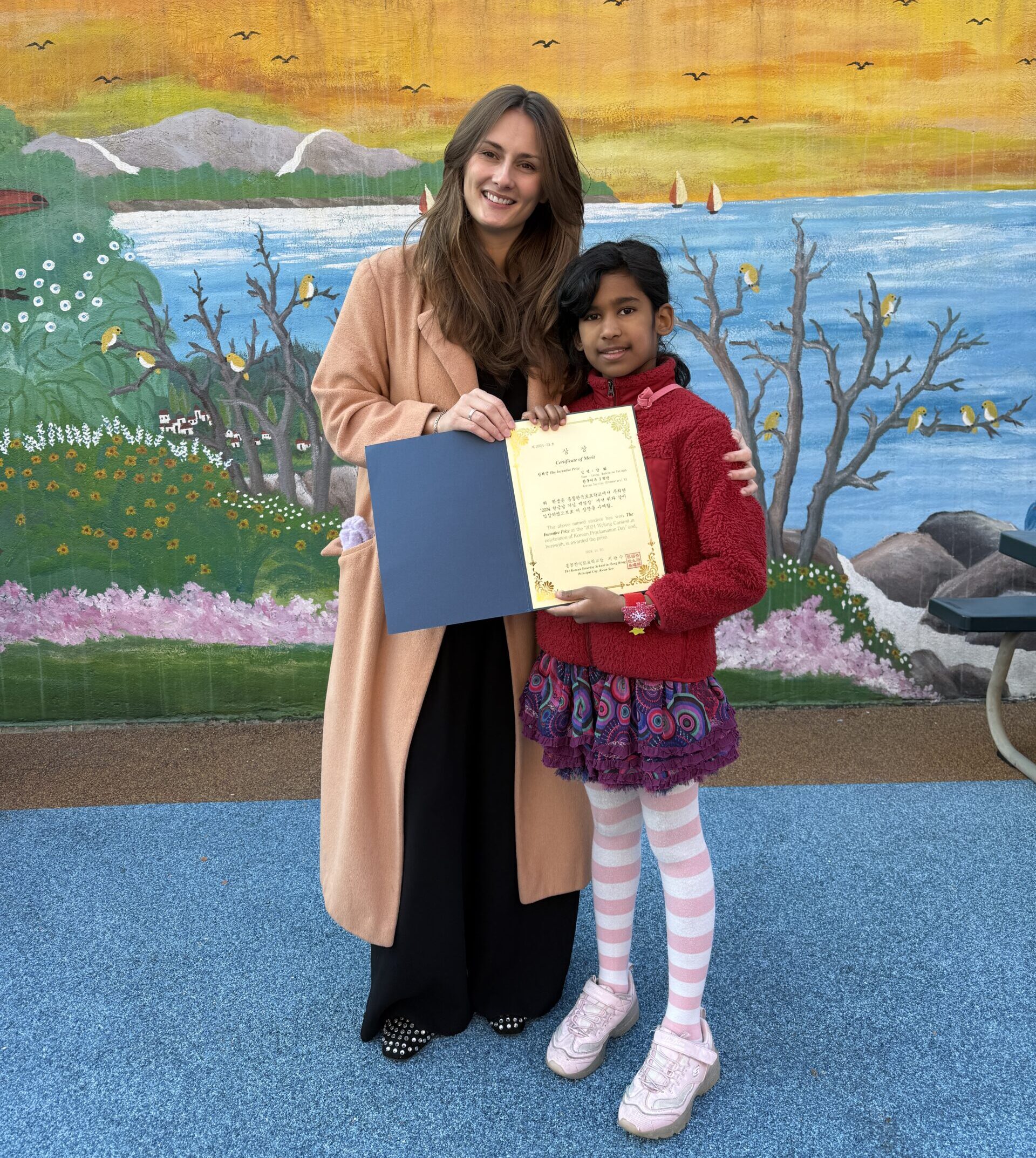 The Certificate of Merit goes to Madeleine FATIMAH(P4)